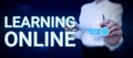 Writing displaying text Learning OnlineLearn something new with the help of internet and technology. Concept meaning Royalty Free Stock Photo