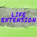 Writing displaying text Life Extension. Concept meaning able to continue working for longer than others of the same kind Royalty Free Stock Photo