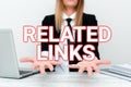 Writing displaying text Related Links. Word Written on Website inside a Webpage Cross reference Hotlinks Hyperlinks Royalty Free Stock Photo