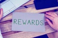 Text sign showing Rewards. Business idea certain number or percentage you earn for every dollar you charge