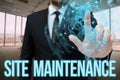 Text sign showing Site Maintenance. Word for keeping the website secure updated running and bugfree Man In Office