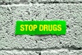 Writing displaying text Stop Drugs. Business approach the process of discontinuing or quitting tobacco smoking Royalty Free Stock Photo