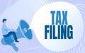 Writing displaying text Tax Filing. Business showcase Submitting documens filed with tax payer financial information