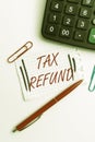 Writing displaying text Tax Refund. Business overview refund on tax when the tax liability is less than the tax paid