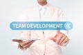 Sign displaying Team Development. Business idea learn why and how small groups change over time with graphs Presenting Royalty Free Stock Photo