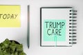 Writing displaying text Trump Care. Word for refers to replacement for Affordable Care Act in united states
