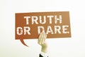 Writing displaying text Truth Or Dare. Conceptual photo Tell the actual facts or be willing to accept a challenge