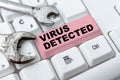 Writing displaying text Virus Detected. Concept meaning a computer program used to prevent and remove malware Creating Royalty Free Stock Photo
