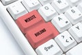 Writing displaying text Website Building. Business showcase site is constructed according to the clients needs Typing Royalty Free Stock Photo