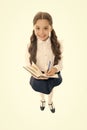 Writing essay. Girl with copy book or workbook. Kid perfect student ready with homework. School girl excellent pupil Royalty Free Stock Photo