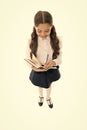 Writing essay. School girl excellent pupil prepared essay or school project. Schoolgirl wear school uniform. Knowledge Royalty Free Stock Photo