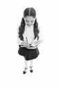 Writing essay. School girl excellent pupil prepared essay or school project. Schoolgirl wear school uniform. Knowledge Royalty Free Stock Photo