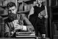 Writing and fees concept. Man in oldfashioned suit holds money. Royalty Free Stock Photo