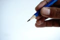 Writing hand. male hand hold blue pen