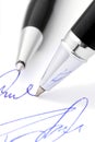 Writing a handwritten signature. Royalty Free Stock Photo