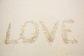 writing love on sand. love message written in sand Royalty Free Stock Photo