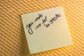 Writing love text on memo post reminder. Sticker with lovely message. Text on notepaper. Valentine`s day concept