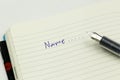 Writing the name on a paper with a pen using for concept of Namesake day Royalty Free Stock Photo