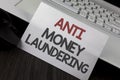 Writing note showing Anti Monay Laundring. Business photo showcasing entering projects to get away dirty money and clean it writt