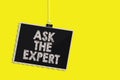 Writing note showing Ask The Expert. Business photo showcasing Looking for professional advice Request Help Support Hanging blackb Royalty Free Stock Photo