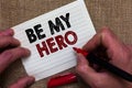 Writing note showing Be My Hero. Business photo showcasing Request by someone to get some efforts of heroic actions for him Man's