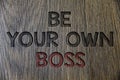 Writing note showing Be Your Own Boss. Business photo showcasing Start company Freelancing job Entrepreneur Start-up Invest Woode