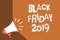 Writing note showing Black Friday 2019. Business photo showcasing day following Thanksgiving Discounts Shopping day News flash bur Royalty Free Stock Photo