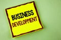 Writing note showing Business Development. Business photo showcasing Develop and Implement Organization Growth Opportunities writ Royalty Free Stock Photo