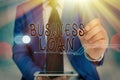 Writing note showing Business Loan. Business photo showcasing Credit Mortgage Financial Assistance Cash Advances Debt