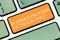 Writing note showing Business Process Outsourcing. Business photo showcasing Contracting work to external service