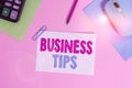 Writing note showing Business Tips. Business photo showcasing tricks or ideas on how to start or run a small business Electronic