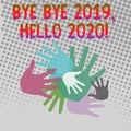 Writing note showing Bye Bye 2019 Hello 2020. Business photo showcasing saying goodbye to last year and welcoming Royalty Free Stock Photo