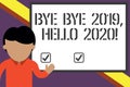 Writing note showing Bye Bye 2019 Hello 2020. Business photo showcasing saying goodbye to last year and welcoming Royalty Free Stock Photo