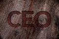 Writing note showing Ceo. Business photo showcasing Chief Executive Officer Head Boss Chairperson Chairman Controller Wooden back