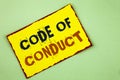 Writing note showing Code Of Conduct. Business photo showcasing Follow principles and standards for business integrity written on Royalty Free Stock Photo