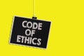 Writing note showing Code Of Ethics. Business photo showcasing Moral Rules Ethical Integrity Honesty Good procedure Hanging blackb