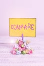 Writing note showing Compare. Business photo showcasing Estimate Measure Note the similarities dissimilarities between Reminder
