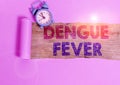 Writing note showing Dengue Fever. Business photo showcasing infectious disease caused by a flavivirus or aedes mosquitoes