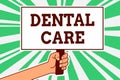 Writing note showing Dental Care. Business photo showcasing maintenance of healthy teeth or to keep it clean for future Man hand h