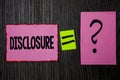 Writing note showing Disclosure. Business photo showcasing The action of making New or Secret Confidential information known Pink