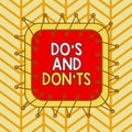 Writing note showing Do S And Don Ts. Business photo showcasing Technologically complication of making a decision Royalty Free Stock Photo