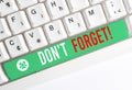 Writing note showing Don T Forget. Business photo showcasing used to remind someone about an important fact or detail Royalty Free Stock Photo