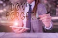 Writing note showing Don T Forget. Business photo showcasing used to remind someone about an important fact or detail Royalty Free Stock Photo