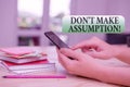 Writing note showing Don T Make Assumption. Business photo showcasing something that you assume to be case even without proof Royalty Free Stock Photo