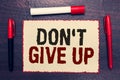 Writing note showing Don t not Give Up. Business photo showcasing Determined Persevering Continue to Believe in Yourself Open note