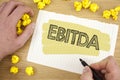 Writing note showing Ebitda. Business photo showcasing Earnings before tax is measured to evaluate company performance written on