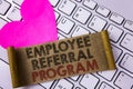 Writing note showing Employee Referral Program. Business photo showcasing strategy work encourage employers through prizes writte