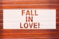 Writing note showing Fall In Love. Business photo showcasing Feeling loving emotions about someone else Roanalysisce Happiness