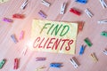 Writing note showing Find Clients. Business photo showcasing to identify or looking for a potential customers or leads Colored