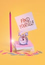Writing note showing Find Yourself. Business photo showcasing To become selfsufficient and do things for yourself Alarm clock Royalty Free Stock Photo